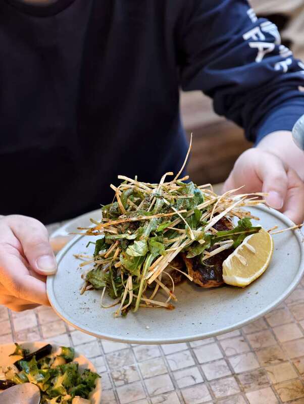 Artfully plated grilled vegetables with fresh herbs